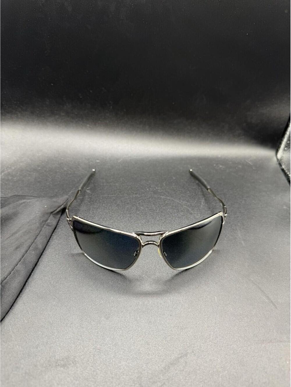 Oakley Inmate Polished Chrome/Black Iridium Polarized Lenses